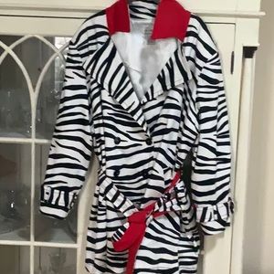 Zebra striped trenchcoat with red accents